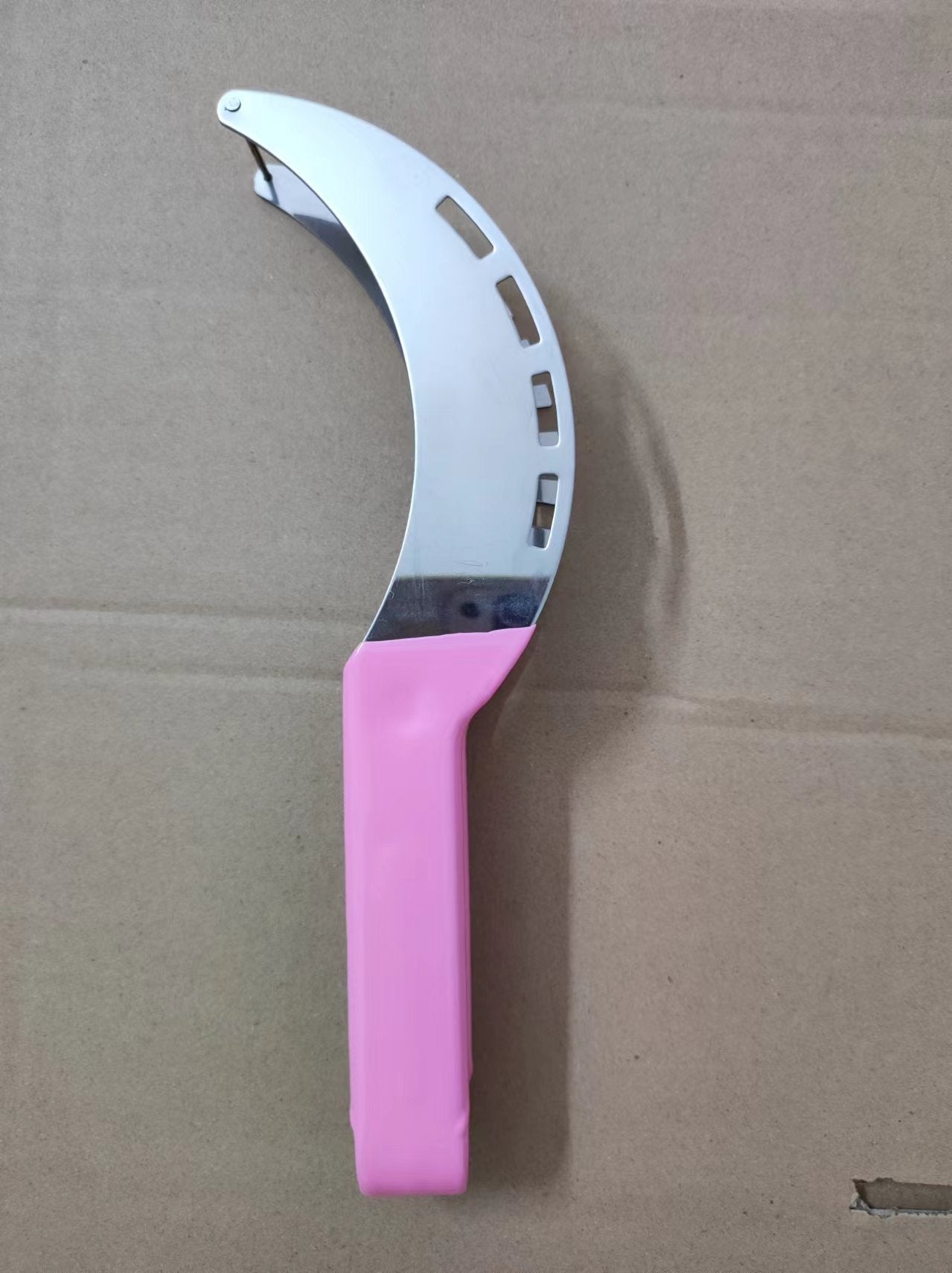 A stainless steel watermelon cutting tool