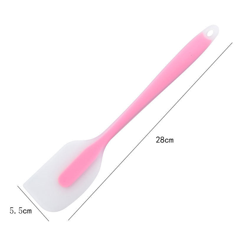 One-piece cream silicone scraper