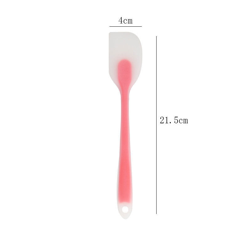 One-piece cream silicone scraper