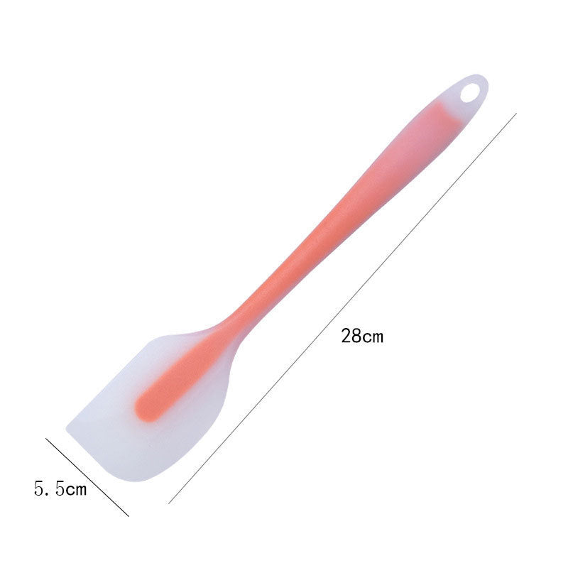 One-piece cream silicone scraper