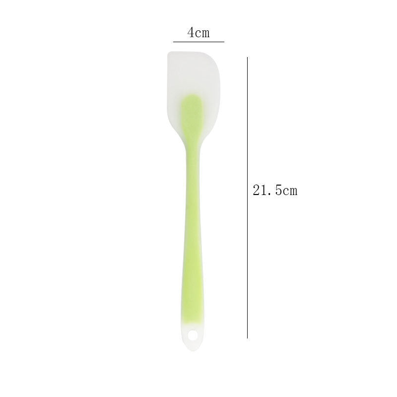 One-piece cream silicone scraper